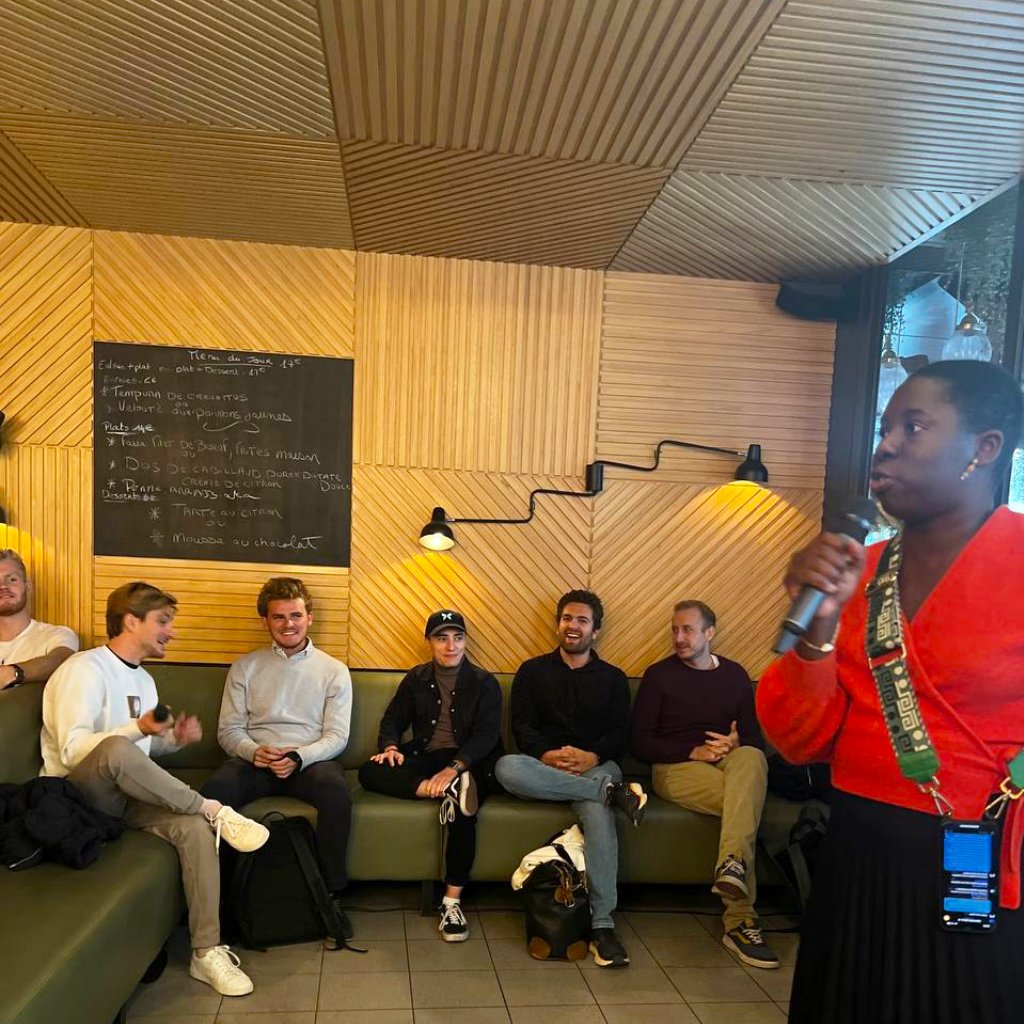 Mariam Kouanda hosting a panel of DeFi founders in Paris